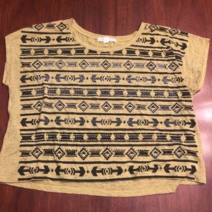 Green loose fitting tee with tribal design